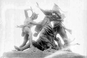 This statue, originally called the Fort Dearborn Massacre, was placed on the site of the battle by property owner George Pullman about the year 1893. The bronze work by Carl Rohl-Smith fell into disrepair. In 1931 it was acquired by the Chicago Historical Society. The statue was moved to the lobby of the museum. In 1972 the subtitle "The Potawatomi Rescue" was added to the monument. It was returned to Prairie Avenue in the 1980's, according to historian John Schmidt. It was removed from the Clarke House grounds in 1997, being put in storage. The statue and the subject of the American relations with native nations remains a politically sensitive subject. Credit: Library of Congress/ Chicago Daily News with the closeup provided by WBEZ.